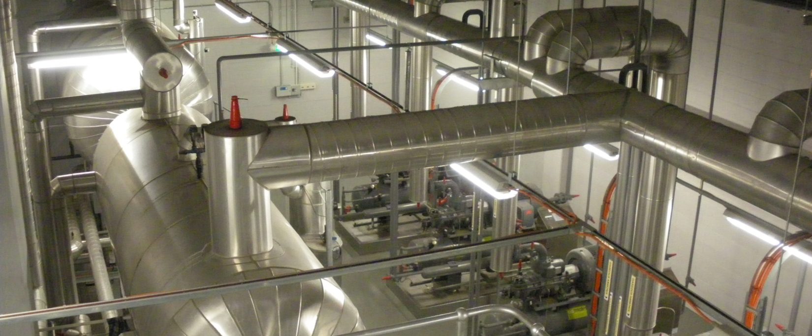 an aerial view of an industrial refrigeration cool room with multiple separator as multiple compressors