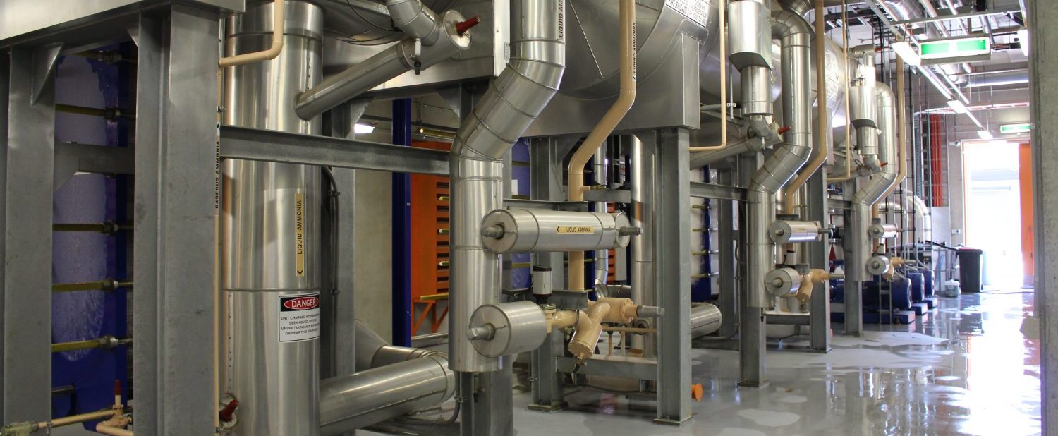 a central refrigeration plant with multiple compressors and other industrial refrigeration equipment