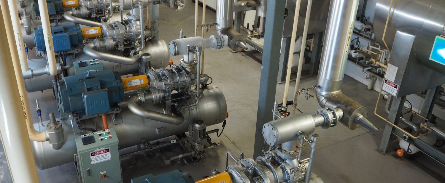 aerial view of a plant room showing compressors and other industrial refrigeration equipment