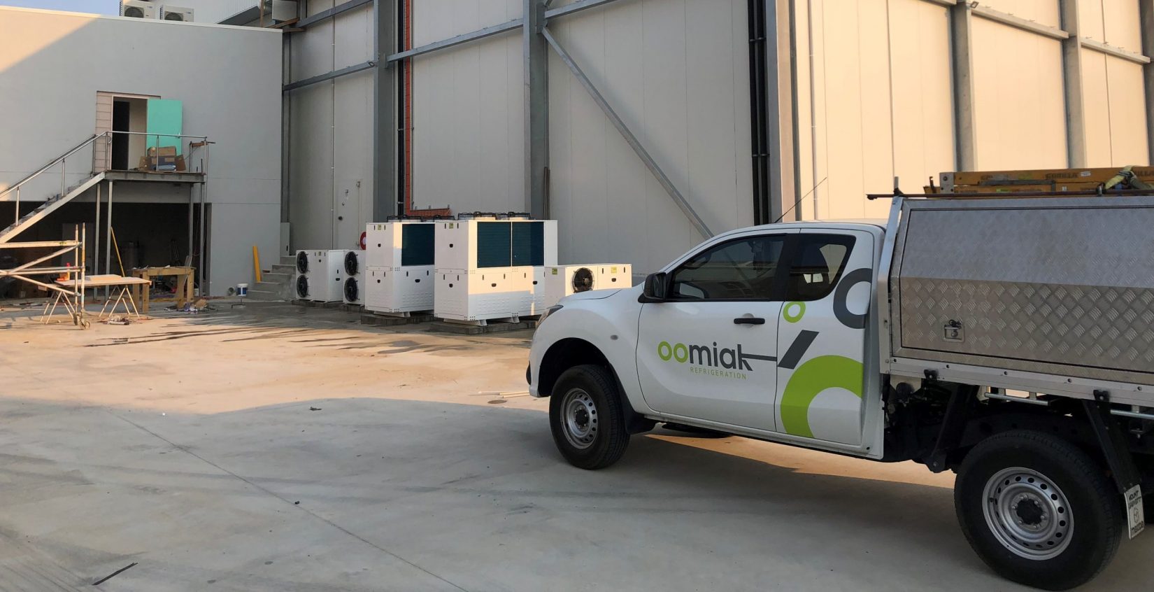 oomiak branded vehicle parked outside a distribution centre