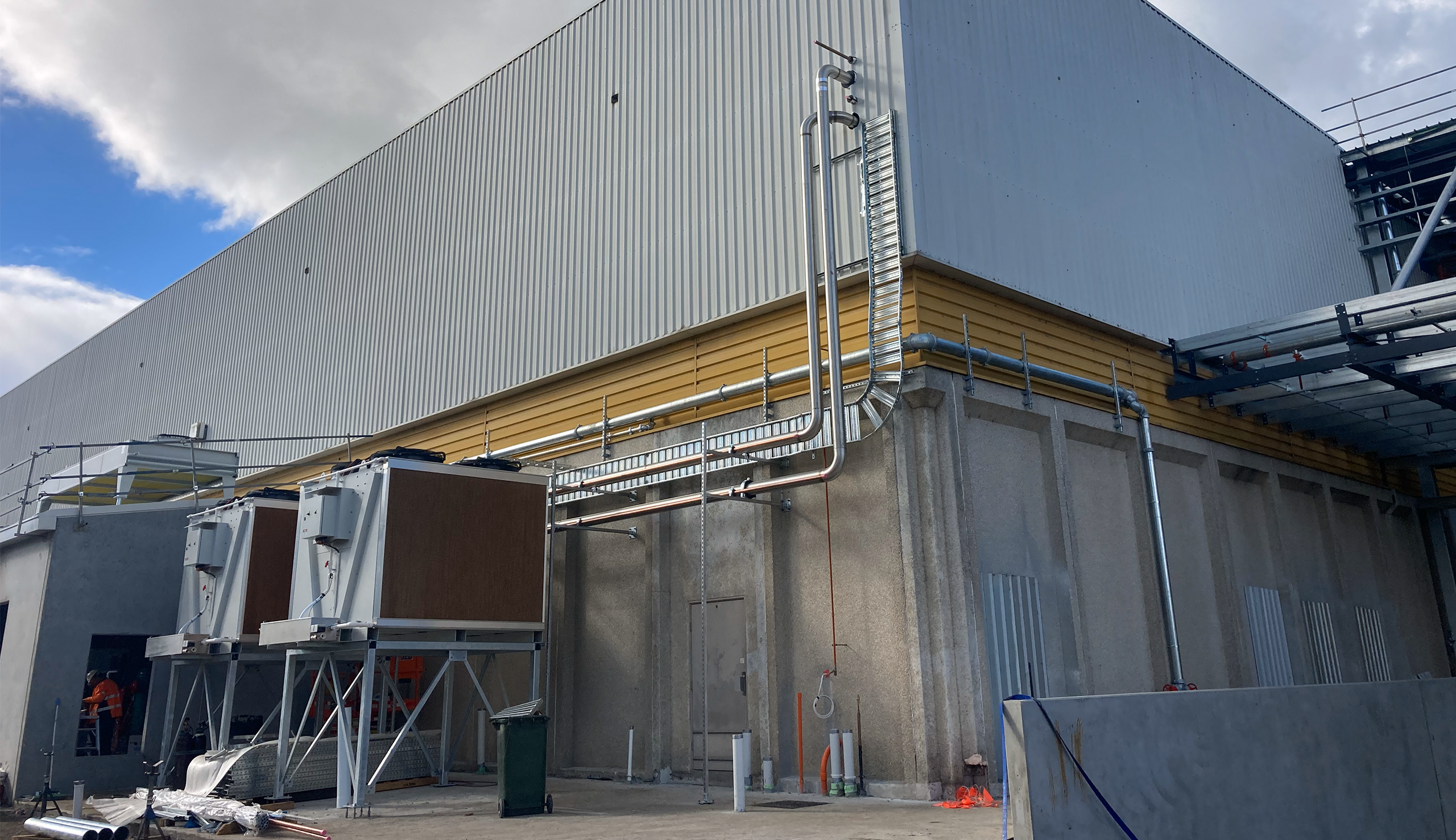 adiabatic coolers mounted to the exterior of a building