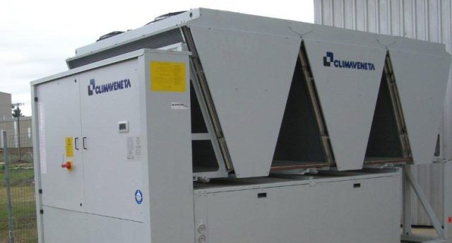 an industrial refrigeration glycol chiller outdoors