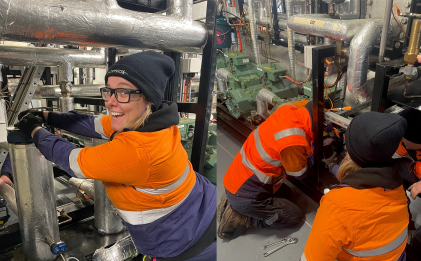 people in high vis workwear performing maintenance tasks in an industrial refrigeration plantroom