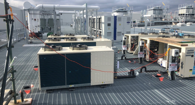 the roof top of an industrial refrigeration plant with different equipment