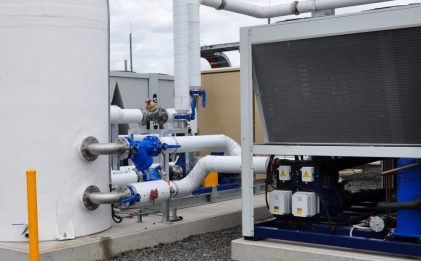 a gas conditioning skid outdoors on a cloudy day