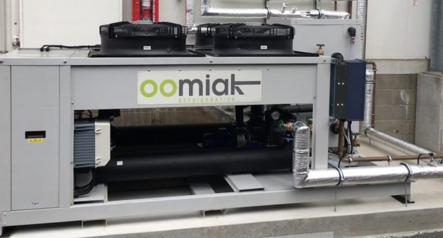 an industrial refrigeration air-cooled water chiller unit with oomiak logo on it