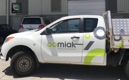 oomiak branded vehicle parked outside a distribution centre