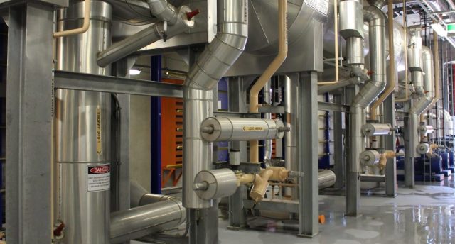 a central refrigeration plant with multiple compressors and other industrial refrigeration equipment