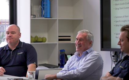three men talking