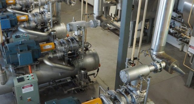 aerial view of a plant room showing compressors and other industrial refrigeration equipment